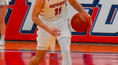 Lincoln County’s Braden Fugate brings the ball up the court during the Patriots’ narrow 45-42 loss to Madison Central. Fugate hit a clutch three-pointer late in the fourth quarter to give Lincoln a brief lead, finishing the game with eight points. (Photo submitted)