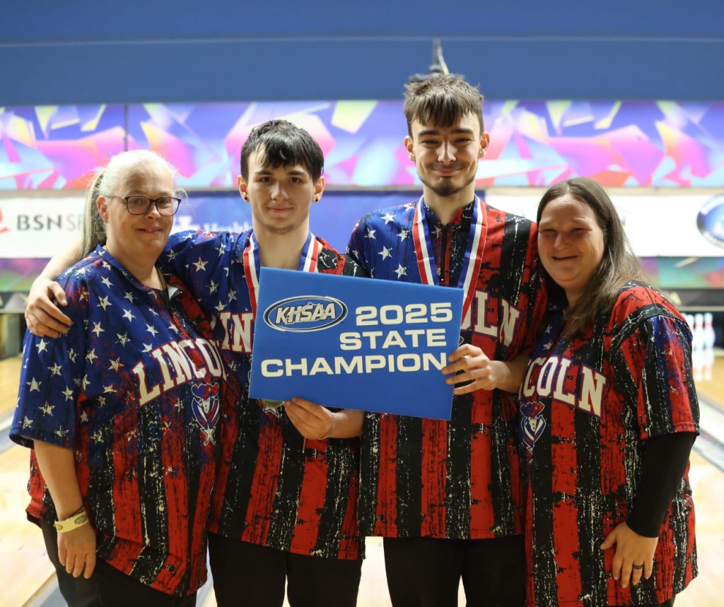 Jordan Hall and Chris Shelton celebrate after winning the state championship in the unified bowling division at the KHSAA State Bowling Championships. (Photo submitted)