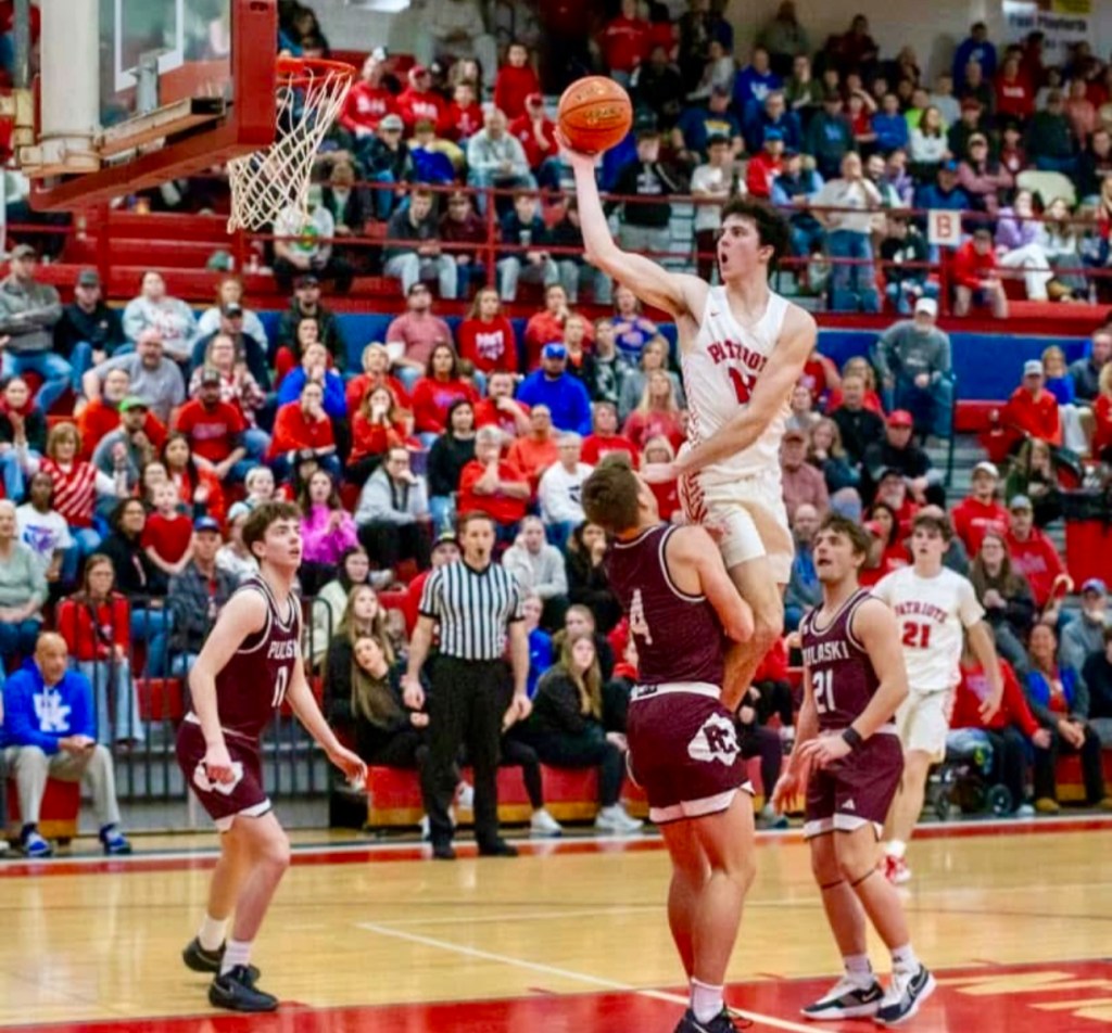 Lincoln County’s Sawyer Robbins elevates for a shot over Pulaski County’s defense during the Patriots’ double-overtime battle against the Maroons in the opening round of the 12th Region Tournament on March 5. (Photo submitted)