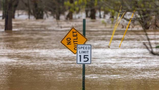 Hanging Fork Creek floods Elliott Road in Lincoln County, Ky., on Friday, April 4, 2025. Ryan C. Hermens