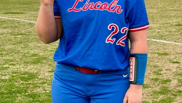 Trinity Price holds the game ball after launching a solo home run in Lincoln County’s 7-5 win over Model on April 1. Price also earned the win in the circle, striking out seven in six innings of work. (LC Athletics photo)