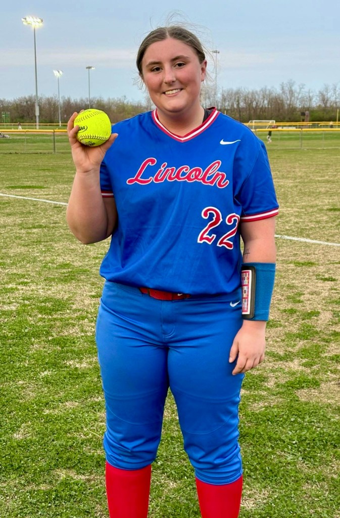 Trinity Price holds the game ball after launching a solo home run in Lincoln County’s 7-5 win over Model on April 1. Price also earned the win in the circle, striking out seven in six innings of work. (LC Athletics photo)