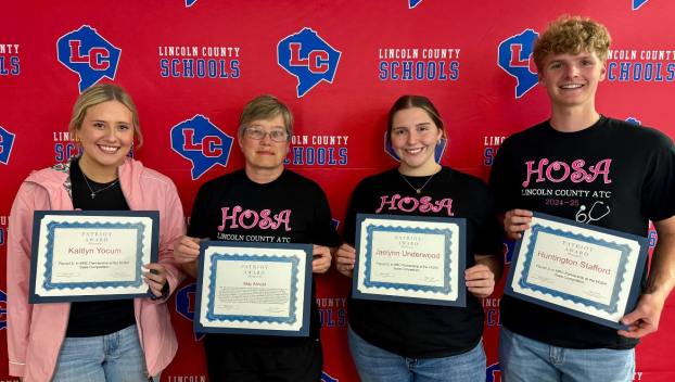 Several students and staff were honored during the meeting. (Lincoln County Schools Facebook photo)