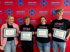 Several students and staff were honored during the meeting. (Lincoln County Schools Facebook photo)