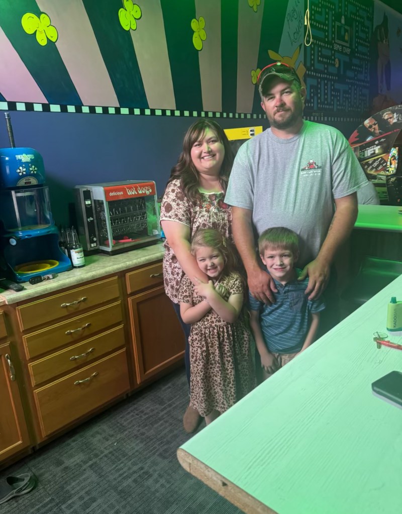 Heather and Joseph Brown pose with their children on opening day at McKinney Crossing Event Center. The family-run arcade and event space has quickly become a favorite gathering spot for local families in Lincoln County. (Photo submitted)