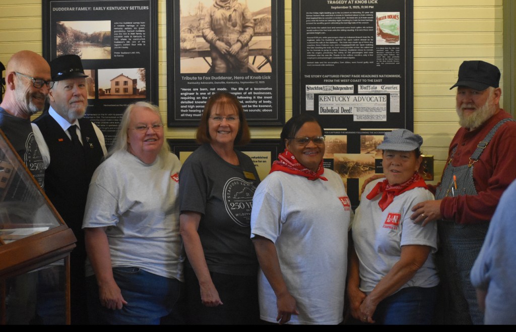 Stanford Mayor Dalton Miller, second from left, joins members of the Lincoln County Historical Society at the L&N Depot and Museum on Sept. 20 during the unveiling of a new display honoring engineer John Fox Dudderar, who died saving passengers in the 1925 L&N train wreck. Photo by: Christopher Brown